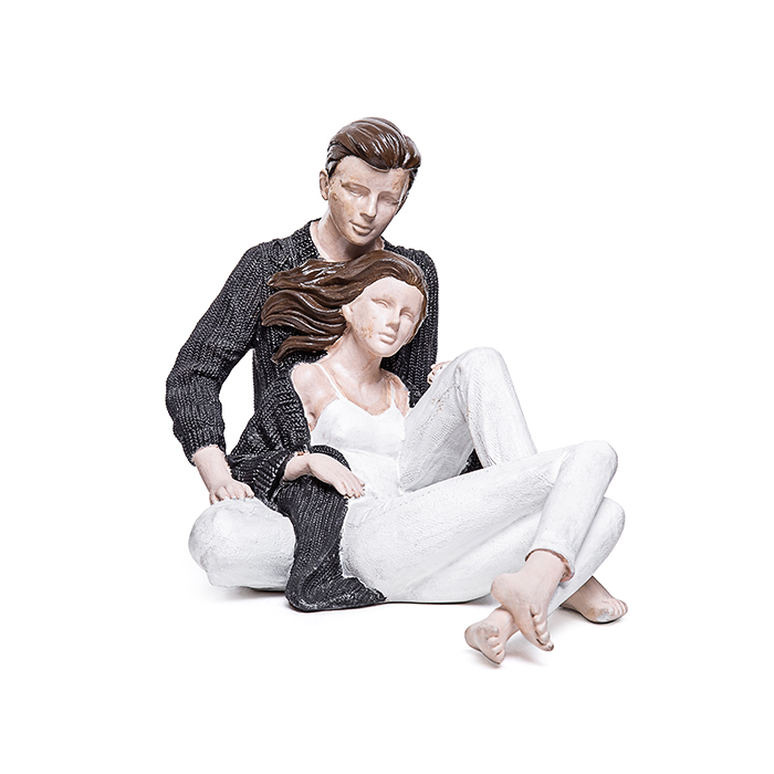 Escultura casal deitado abraçado 20x29x17cm