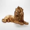 Escultura leao em repouso dourado 21x40x20cm